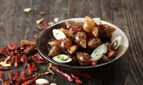 海螺的黄可以吃,海螺下面黄色的能吃吗图6